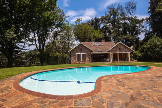 Cottage Home Pool Landscape