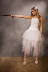 Fototapeta premium bride with a pistol