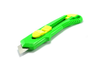 Green stationery knife on a white background