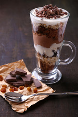 Yogurt, with chocolate cream, chopped chocolate and muesli
