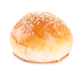 Tasty bun with sesame isolated on white