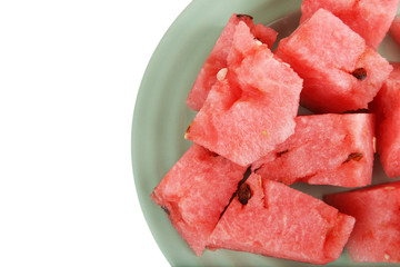 Slices of watermelon on plate isolated on white