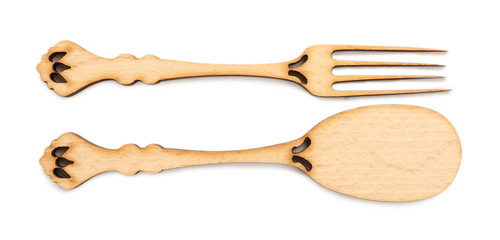 Decorative wooden utensils isolated on white