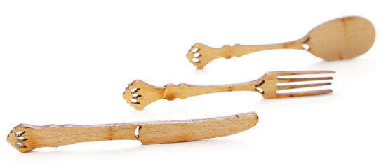 Decorative wooden utensils isolated on white