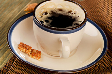 Coffee cup  on a  wooden table