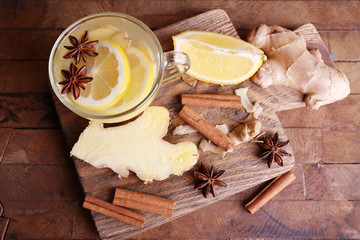 Cup of ginger drink with lemon
