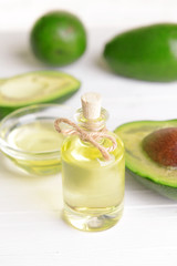 Avocado oil on table close-up