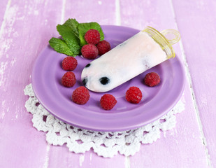 Tasty ice cream pop with fresh berries