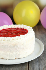 White cake on bright background