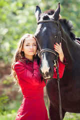 Obraz premium brunette girl and horse
