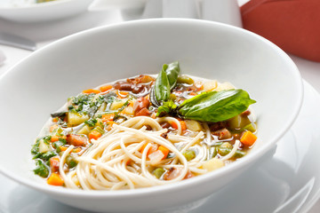 Chicken soup with pasta and vegetables.
