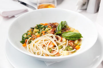Chicken soup with pasta and vegetables.