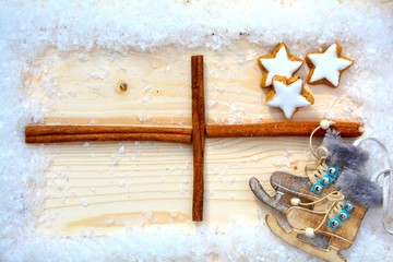 weihnachtlicher Rahmen - Zimtsterne und Schlittschuhe