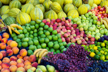 Variety of fresh organic fruits on the street stall