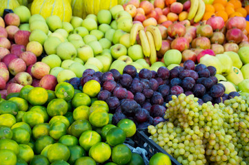 Variety of fresh organic fruits on the street stall