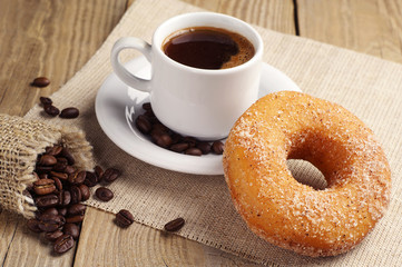 Donut with sugar and coffee