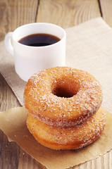 Donut with sugar and coffee