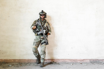 american soldier poses during military operation