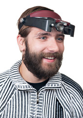 the man with a beard in magnifying points