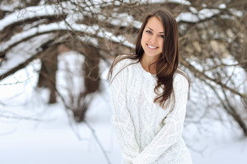 Winter portrait of beautiful smiling woman