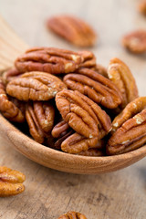 pecan nuts in a spoon