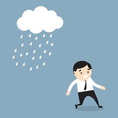 Businessman escapes from the rain