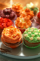 Tasty cupcakes on table, close up