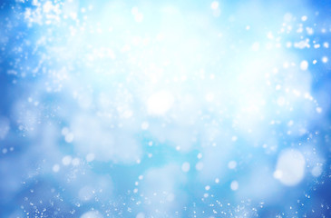 Fototapeta na wymiar Winter background with lots of snowing white bokeh
