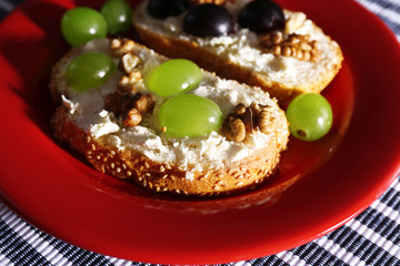 tasty bread with grape and cheese, close up