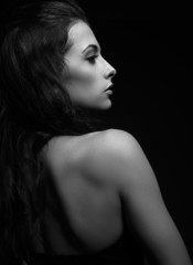Beautiful woman face profile looking. Black and white portrait