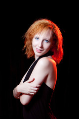 Naklejka premium Redhead woman showing tongue
