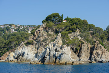 Fototapeta na wymiar Rocks Punta de s’Agulla near Santa Cristina beach, Costa Brava