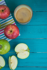 Farm fresh organic red and green apples pressed juice in glass