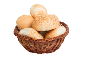 bread in a wicker basket isolated on white background
