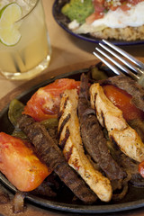 steak and chicken fajitas with an agave nectar margarita