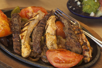 steak and chicken fajitas with gucamole