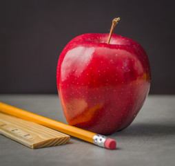 School time red apple, pencil, ruler