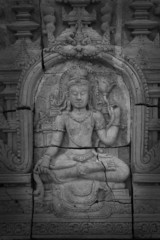 Low relief cement Thai style handcraft of hindu gods.