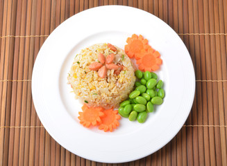 Rice with vegetables and sausages