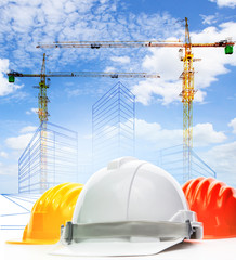 safety helmet against sketching of building construction with li