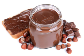 Sweet chocolate cream in jar isolated on white