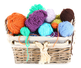 Fototapeta na wymiar Multicoloured knitting yarn in basket isolated on white
