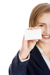 Beautiful smiling businesswoman with businesscard