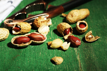 Peanuts on wooden background