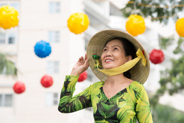 Woman in a wide-brimmed bamboo hat