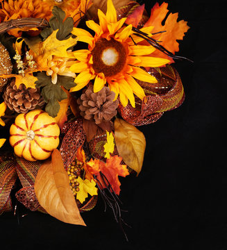 Autumn or Thanksgiving Bouquet over black background. Pumpkin
