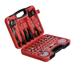 Red toolbox with different instruments isolated on white