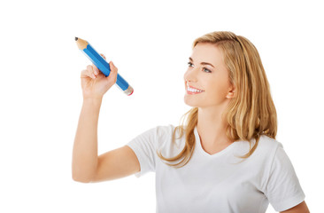 Woman writing with pencil