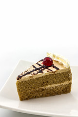 Coffee cake slice on white background.