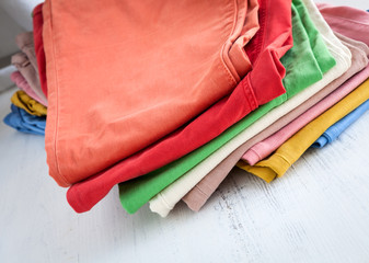 Colors pants on wooden table